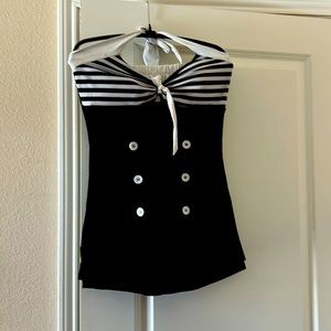 Nautical, one piece swimsuit with skort like bottom. Vintage look.